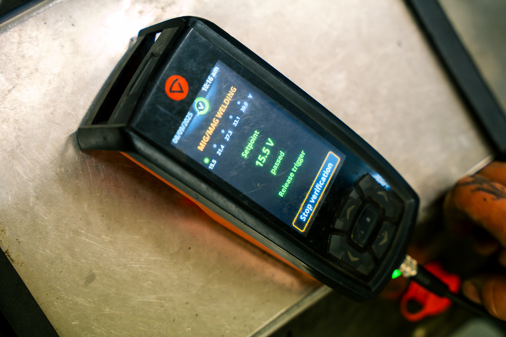 Shropshire Welding Solutions handheld digital control device on a workbench.